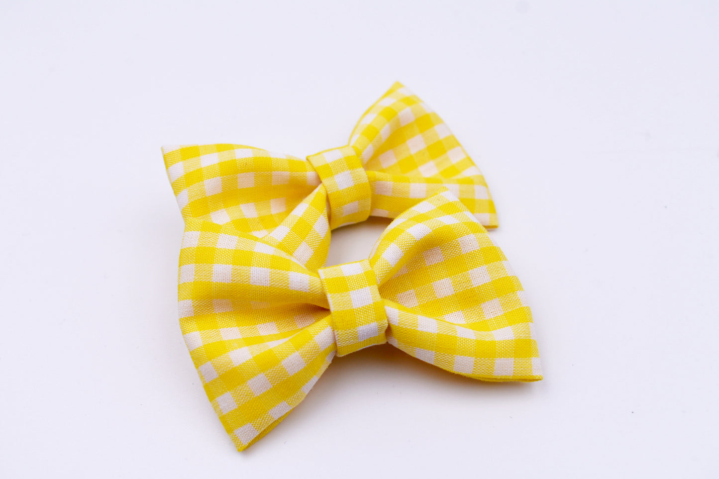 Yellow and white checkered pigtail hair bows