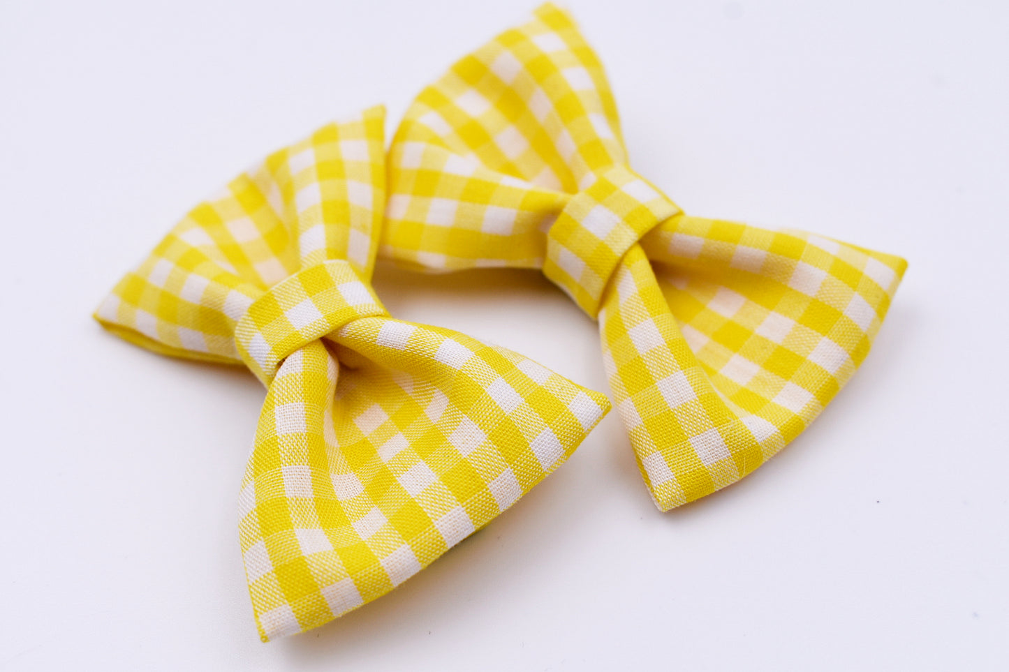 Yellow and white checkered pigtail hair bows