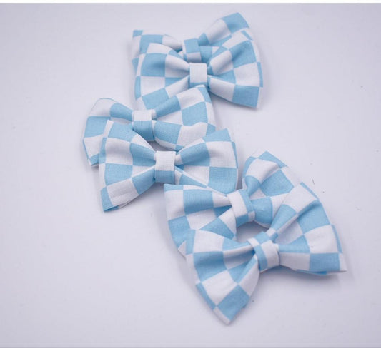 Blue and white checker pigtail hair bows